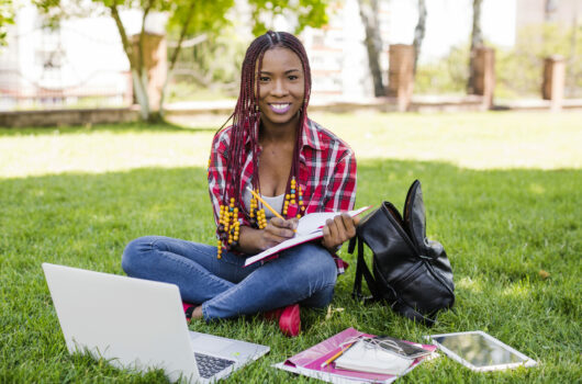 pretty-girl-with-studies-posing-park